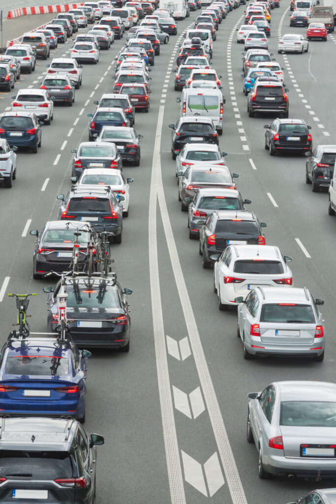 Lines of cars waiting to go through toll booth